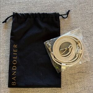 Bandolier Beige Leather Phone Crossbody Strap with Black Drawstring Pouch
